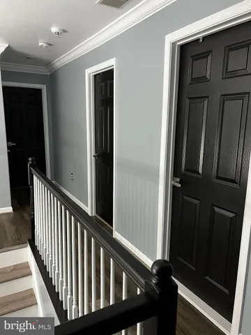 a view of a balcony from a hallway