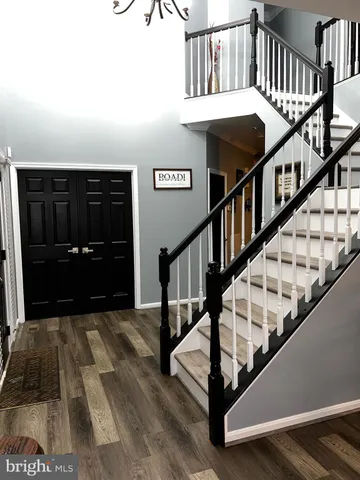 a view of entryway with a front door