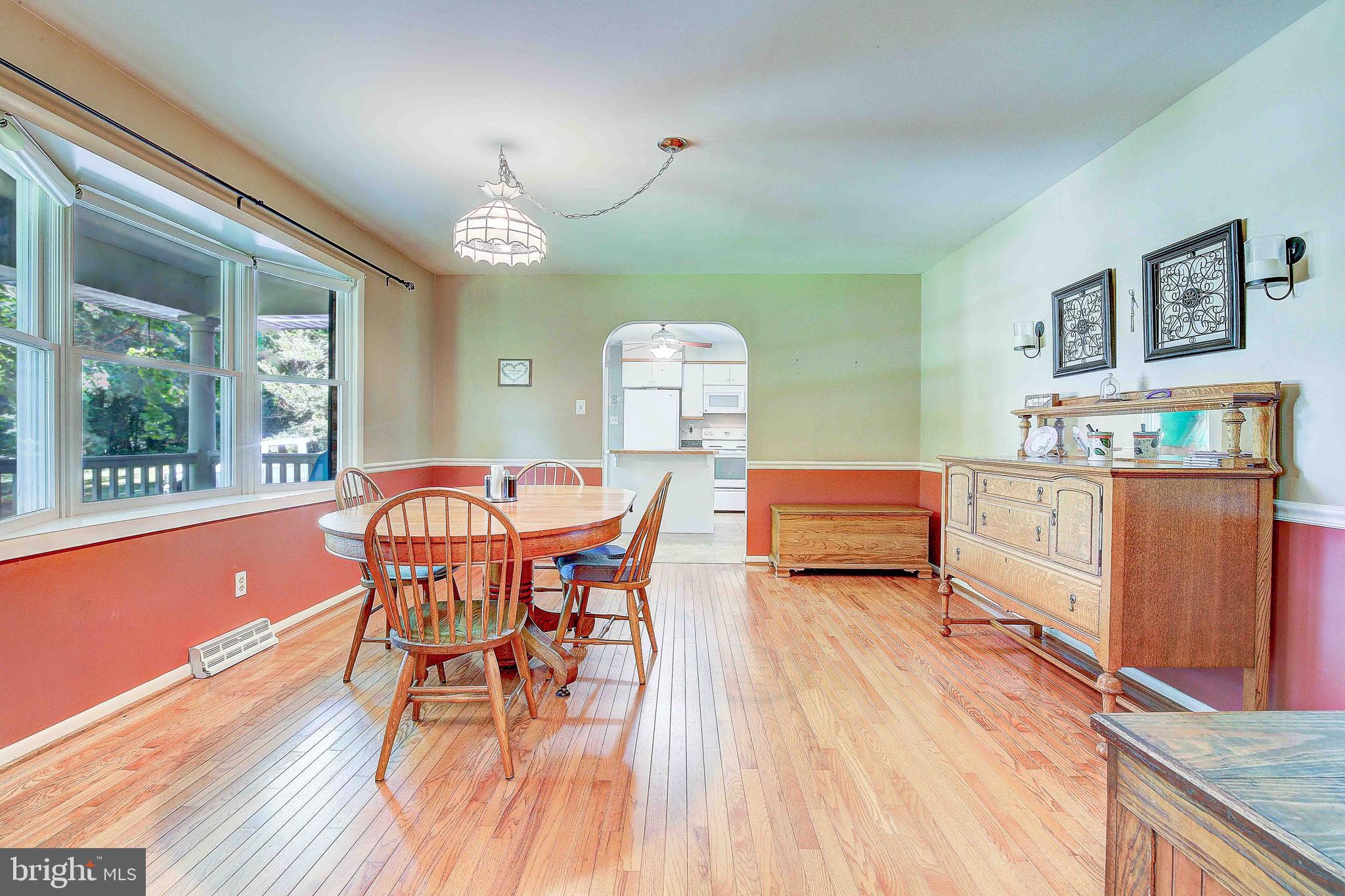 1010 Cox Road Huntingtown, MD 20639 - Photo 7 of 33 a living room with furniture and a wooden floor