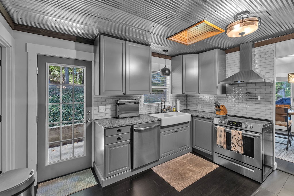 1937 Dagmar Place Decatur, IL 62521 - Photo 23 of 39 a kitchen that has a lot of cabinets in it
