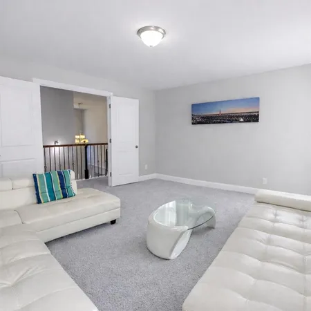 a living room with furniture and a couch