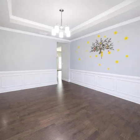 a view of a chandelier in big room