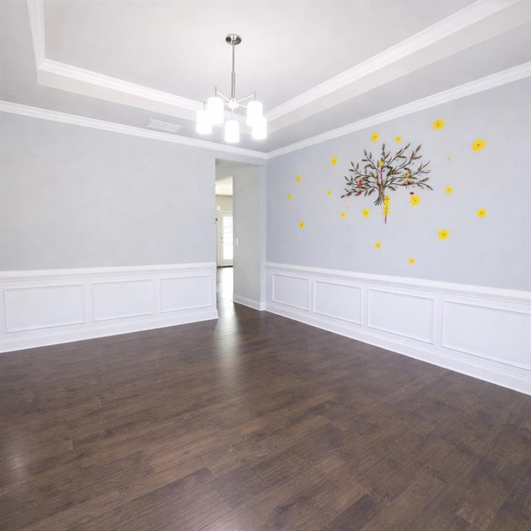 25 Hornbeam Way Covington, GA 30014 - Photo 5 of 31 a view of a chandelier in big room