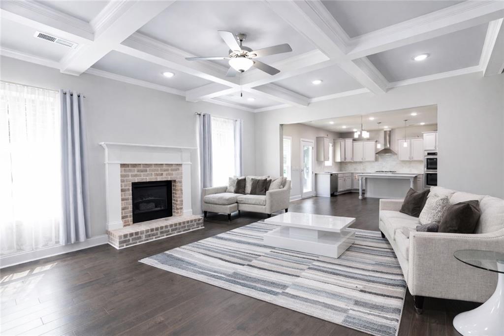 25 Hornbeam Way Covington, GA 30014 - Photo 7 of 31 a living room with furniture and a fireplace