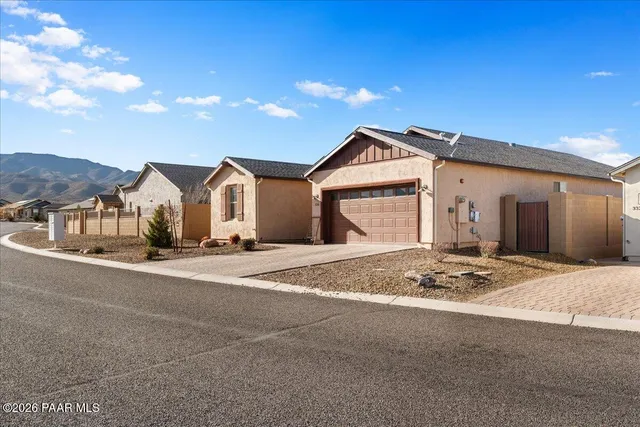 a view of a house with a snow