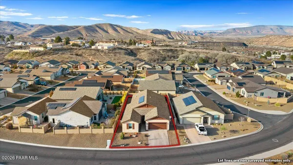 an aerial view of residential building with parking space