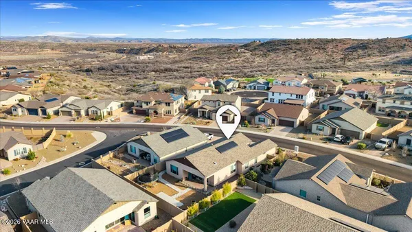 an aerial view of residential house with outdoor space