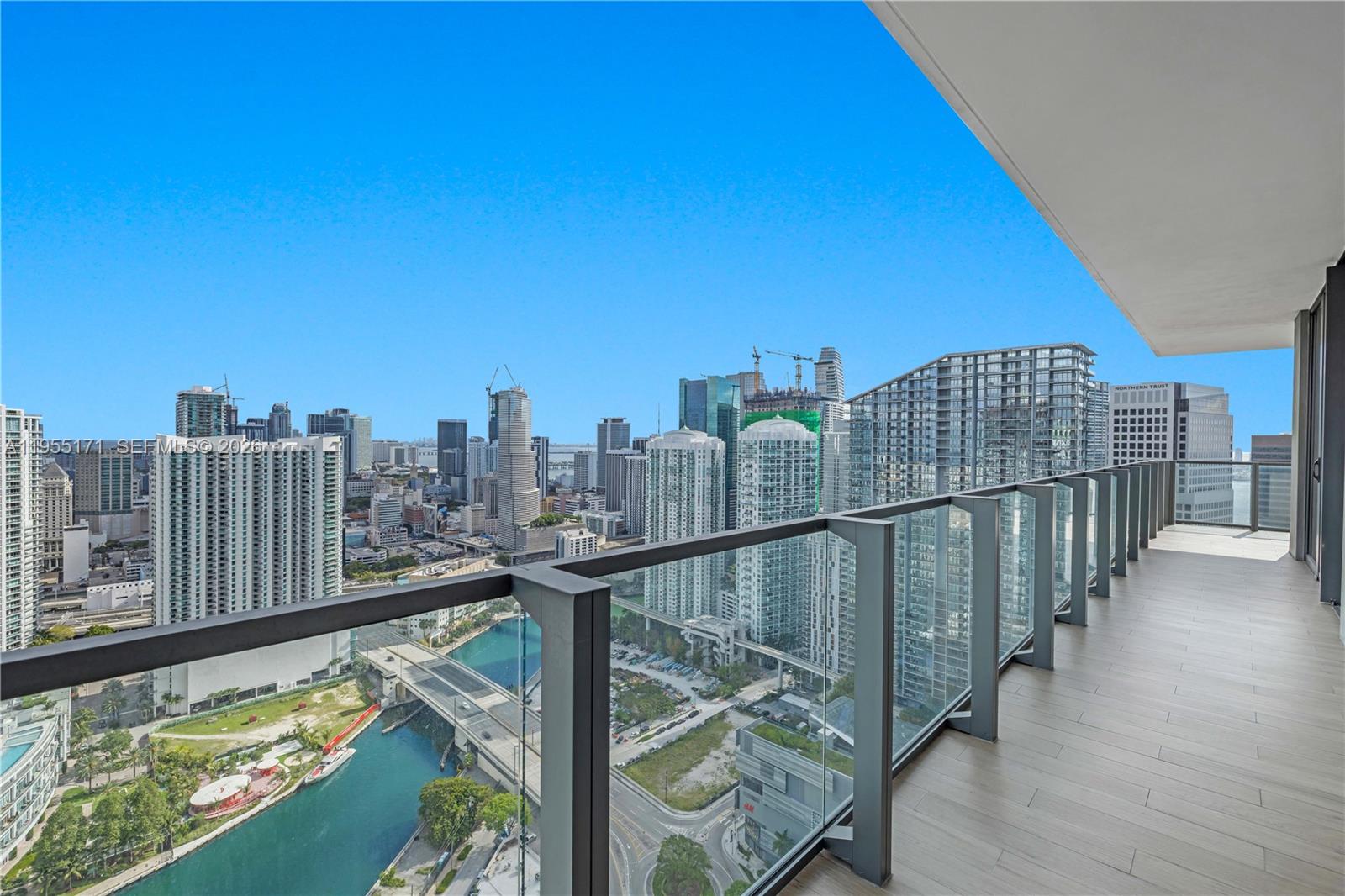 88 Southwest 7th Street, Unit 3711 Miami, FL 33130 - Photo 11 of 47 a view of a balcony with city