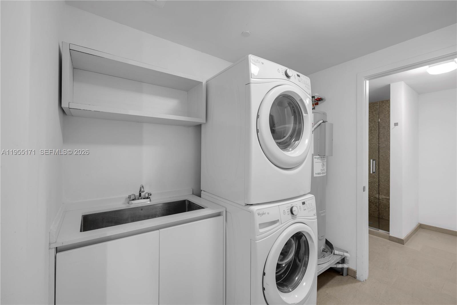 88 Southwest 7th Street, Unit 3711 Miami, FL 33130 - Photo 19 of 47 a utility room with dryer and washer