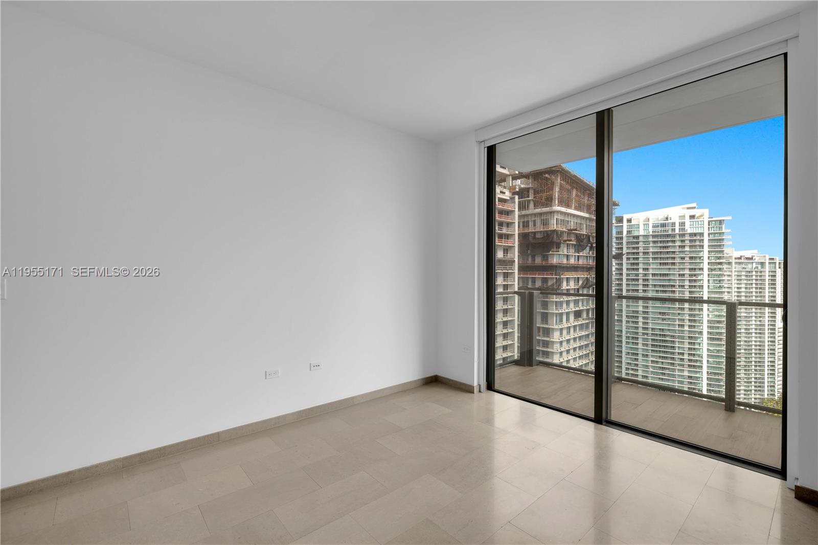 88 Southwest 7th Street, Unit 3711 Miami, FL 33130 - Photo 21 of 47 a view of an empty room with glass door