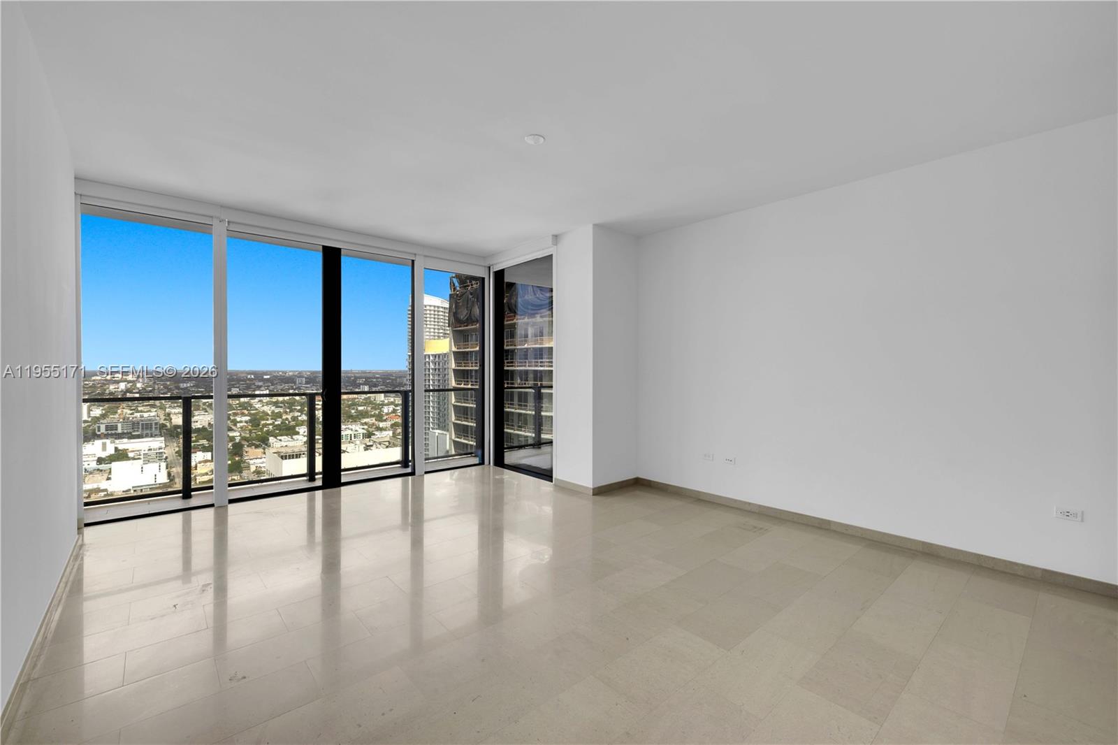88 Southwest 7th Street, Unit 3711 Miami, FL 33130 - Photo 33 of 47 a view of an empty room with a window