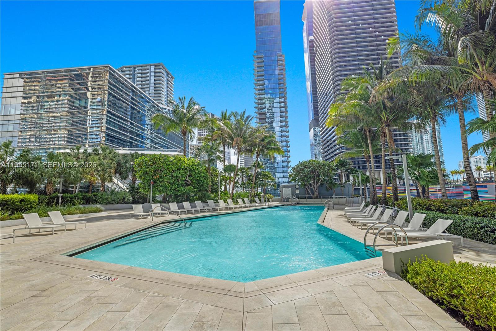88 Southwest 7th Street, Unit 3711 Miami, FL 33130 - Photo 46 of 47 a view of a swimming pool with a patio