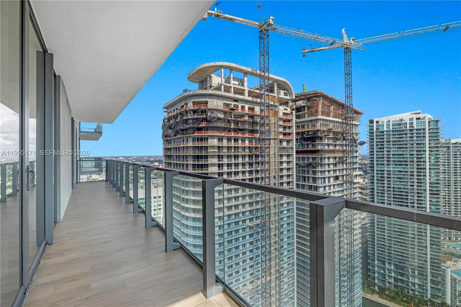 88 Southwest 7th Street, Unit 3711 Miami, FL 33130 - Photo 10 of 47 a view of a balcony with city view