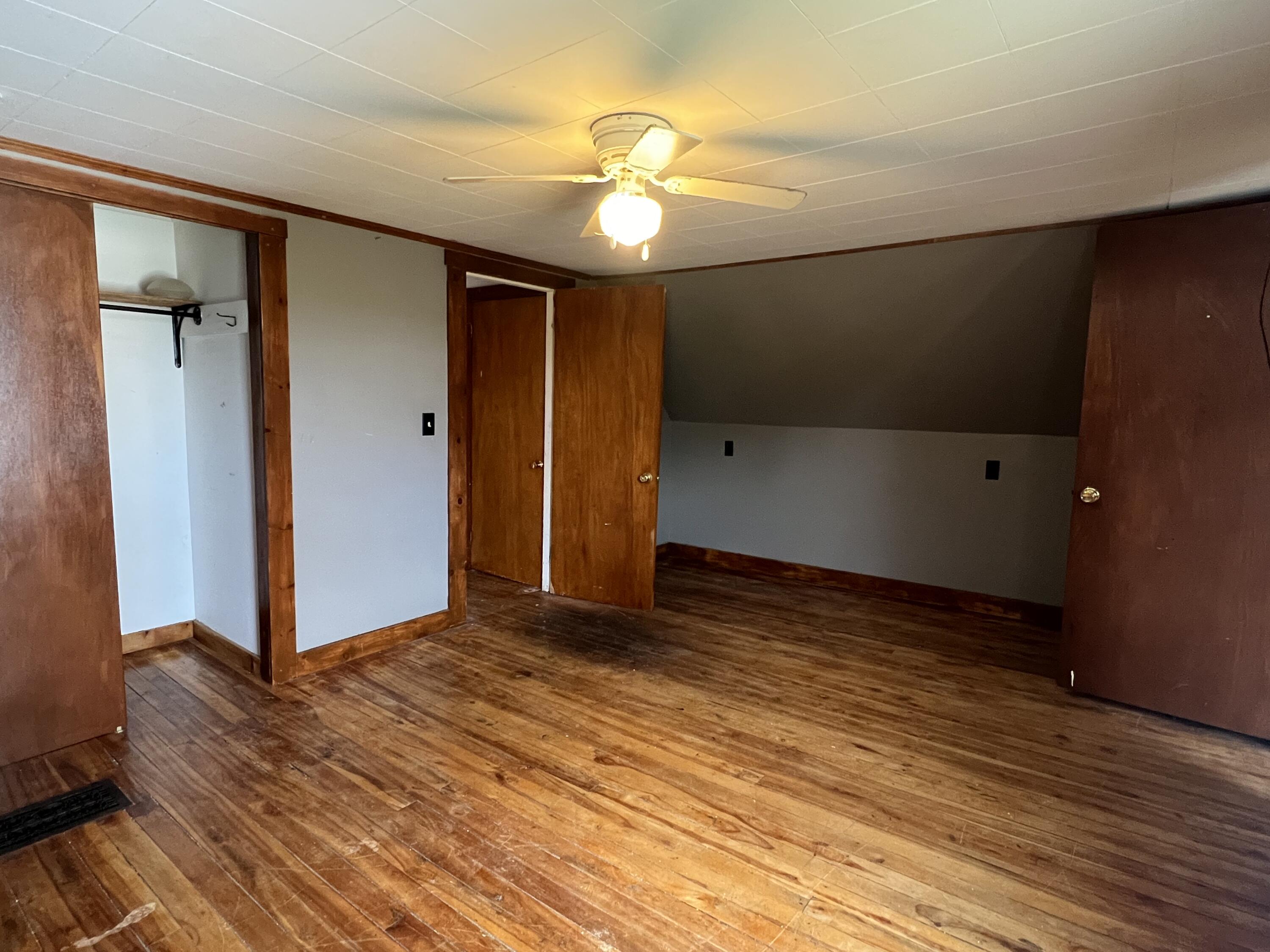 1465 Waterville Road Belfast, ME 04915 - Photo 19 of 31 Middle Upstairs bedroom with closets