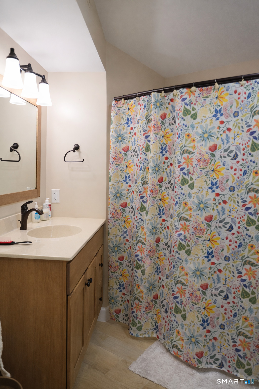 2 Mansfield Grove Road, Unit 170 East Haven, CT 06512 - Photo 11 of 27 a bathroom with a sink and a mirror