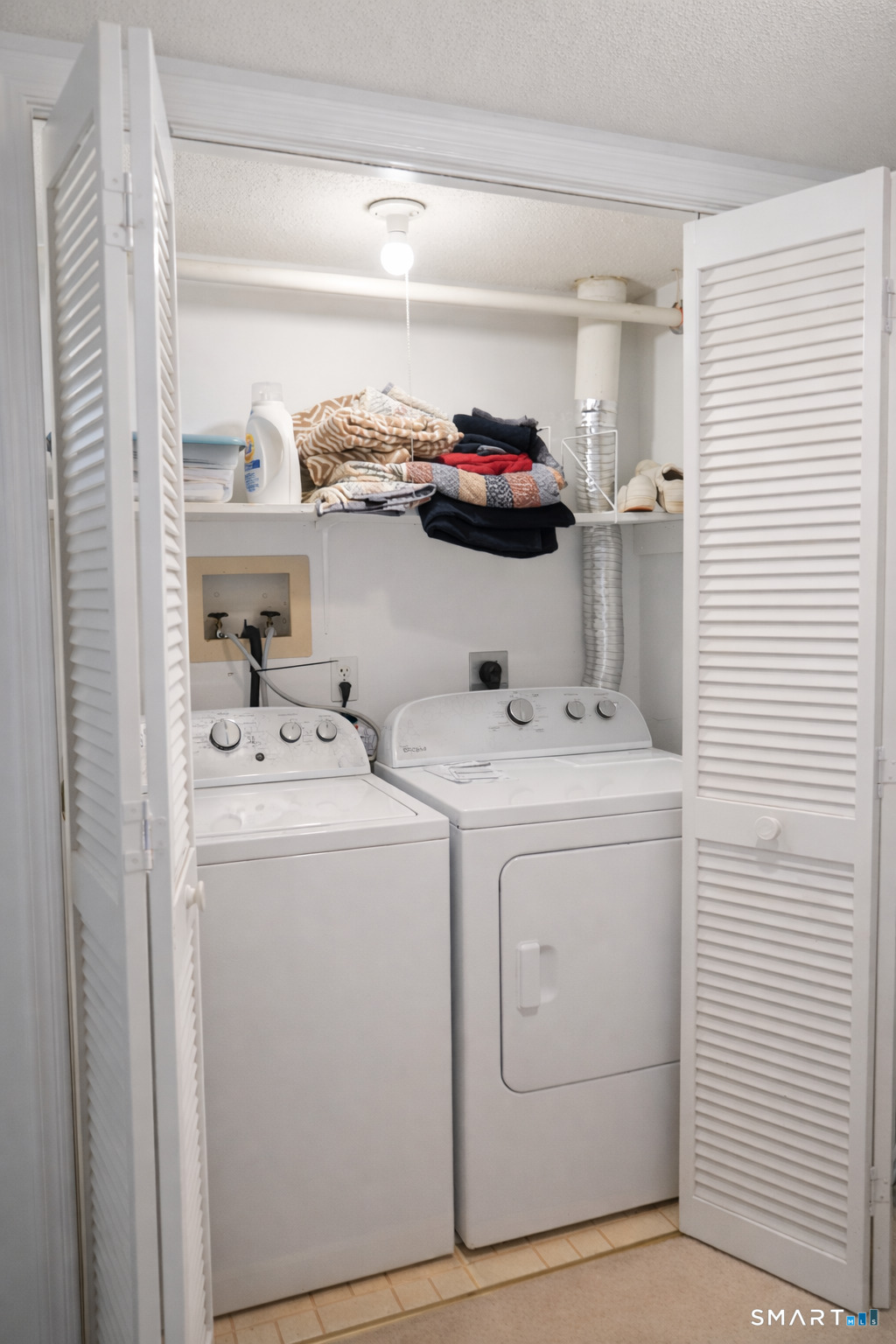 2 Mansfield Grove Road, Unit 170 East Haven, CT 06512 - Photo 14 of 27 a utility room with dryer and washer