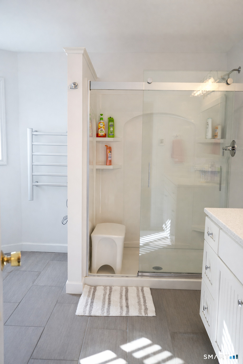 2 Mansfield Grove Road, Unit 170 East Haven, CT 06512 - Photo 18 of 27 a bathroom with a toilet a sink and a shower