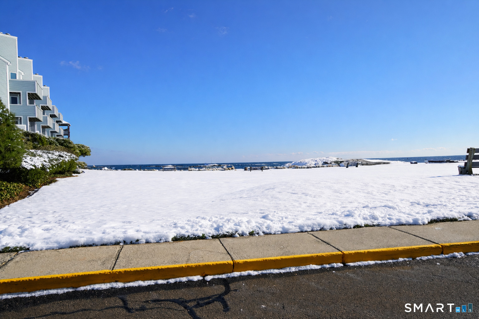 2 Mansfield Grove Road, Unit 170 East Haven, CT 06512 - Photo 26 of 27 a view of a large body of water and beach