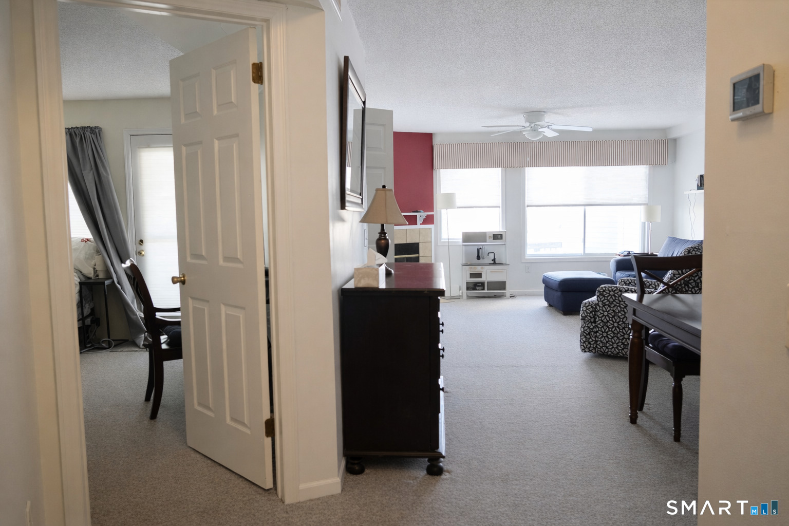 2 Mansfield Grove Road, Unit 170 East Haven, CT 06512 - Photo 4 of 27 a view of a livingroom with furniture and a window