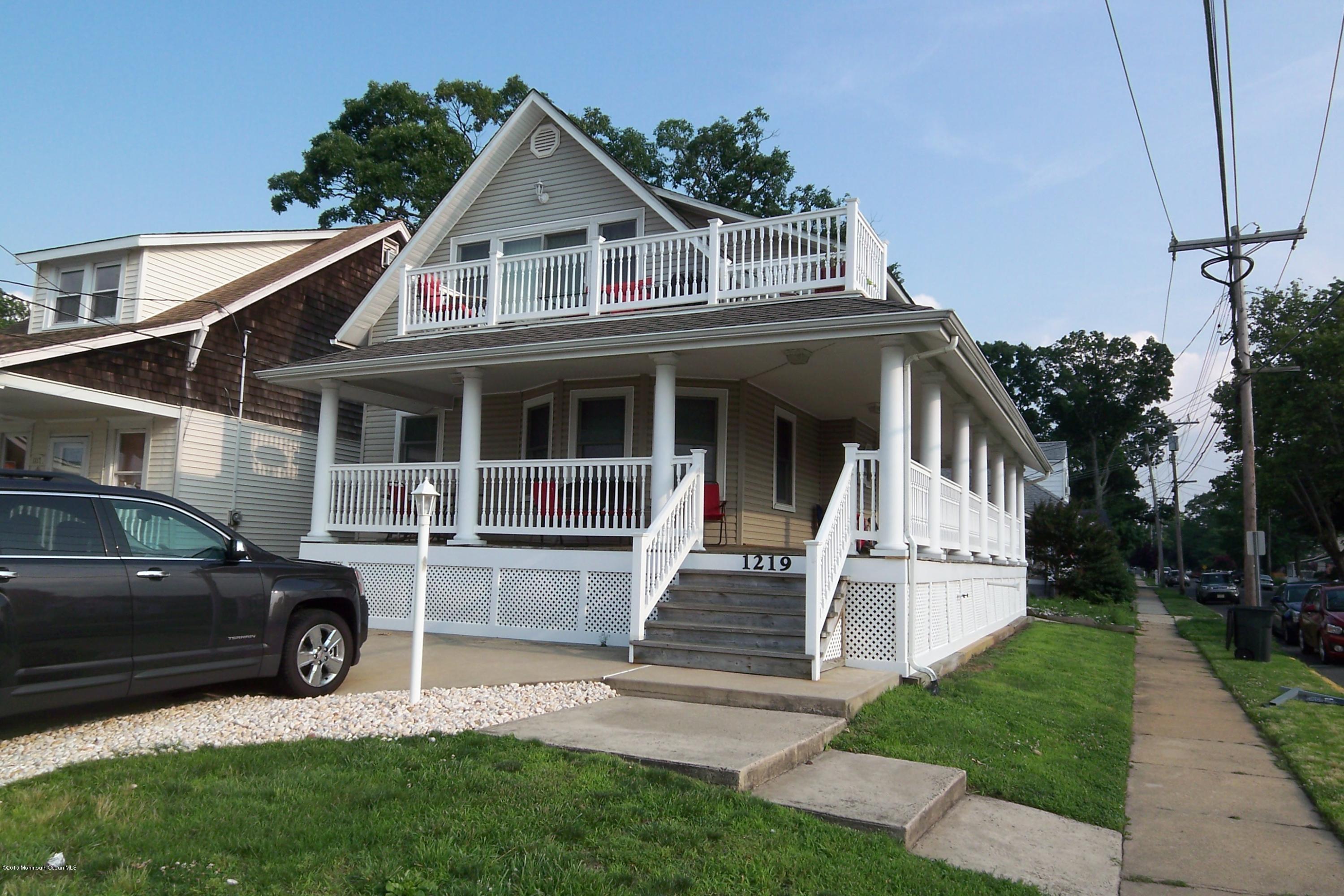 1219 River Road Belmar, NJ 07719 - Photo 1 of 14 a view of a car in front of house