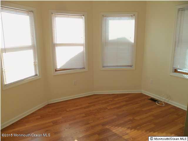 1219 River Road Belmar, NJ 07719 - Photo 7 of 14 an empty room with a window