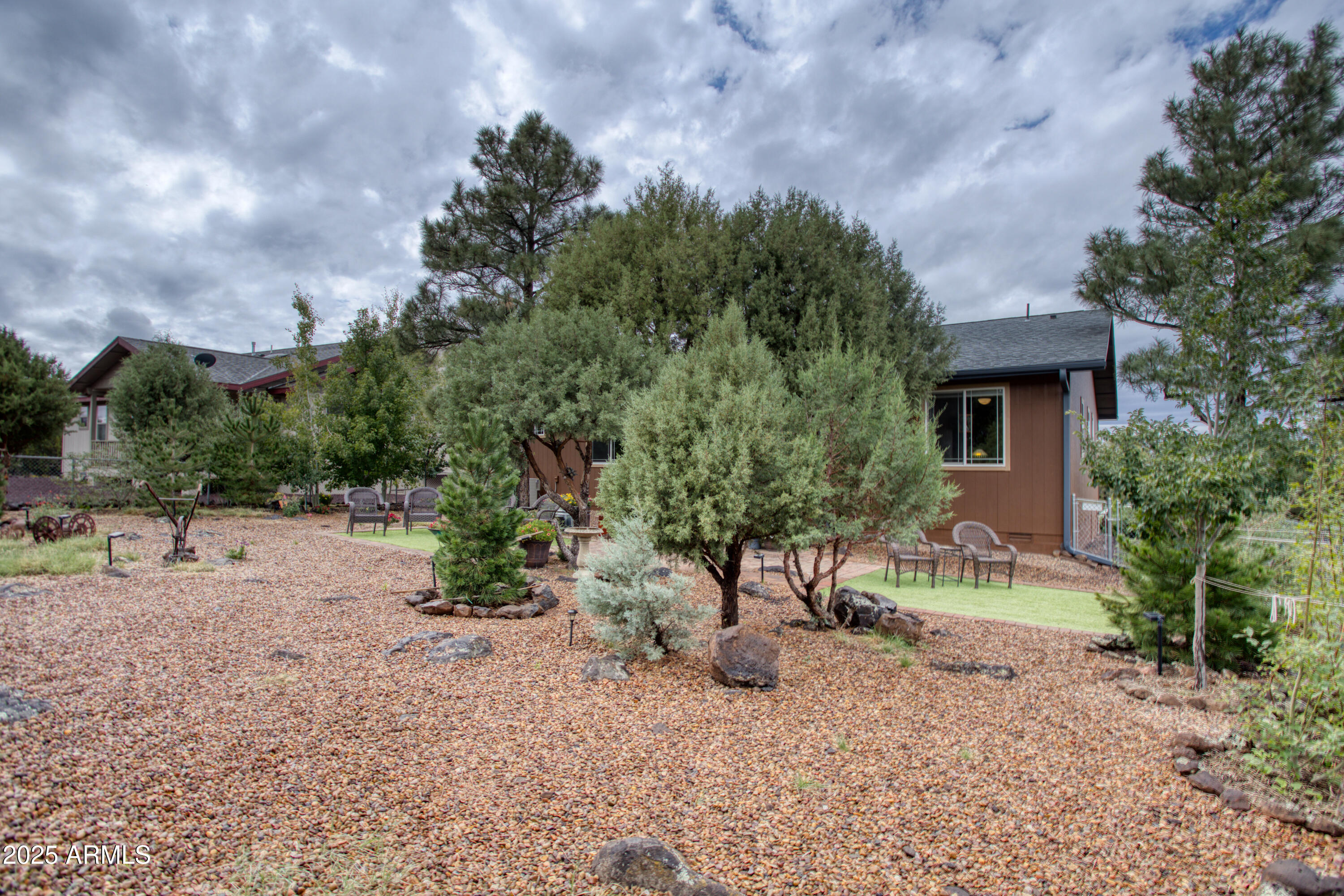 901 South Ridgeline Drive Show Low, AZ 85901 - Photo 26 of 31 a view of a house with a yard and sitting area