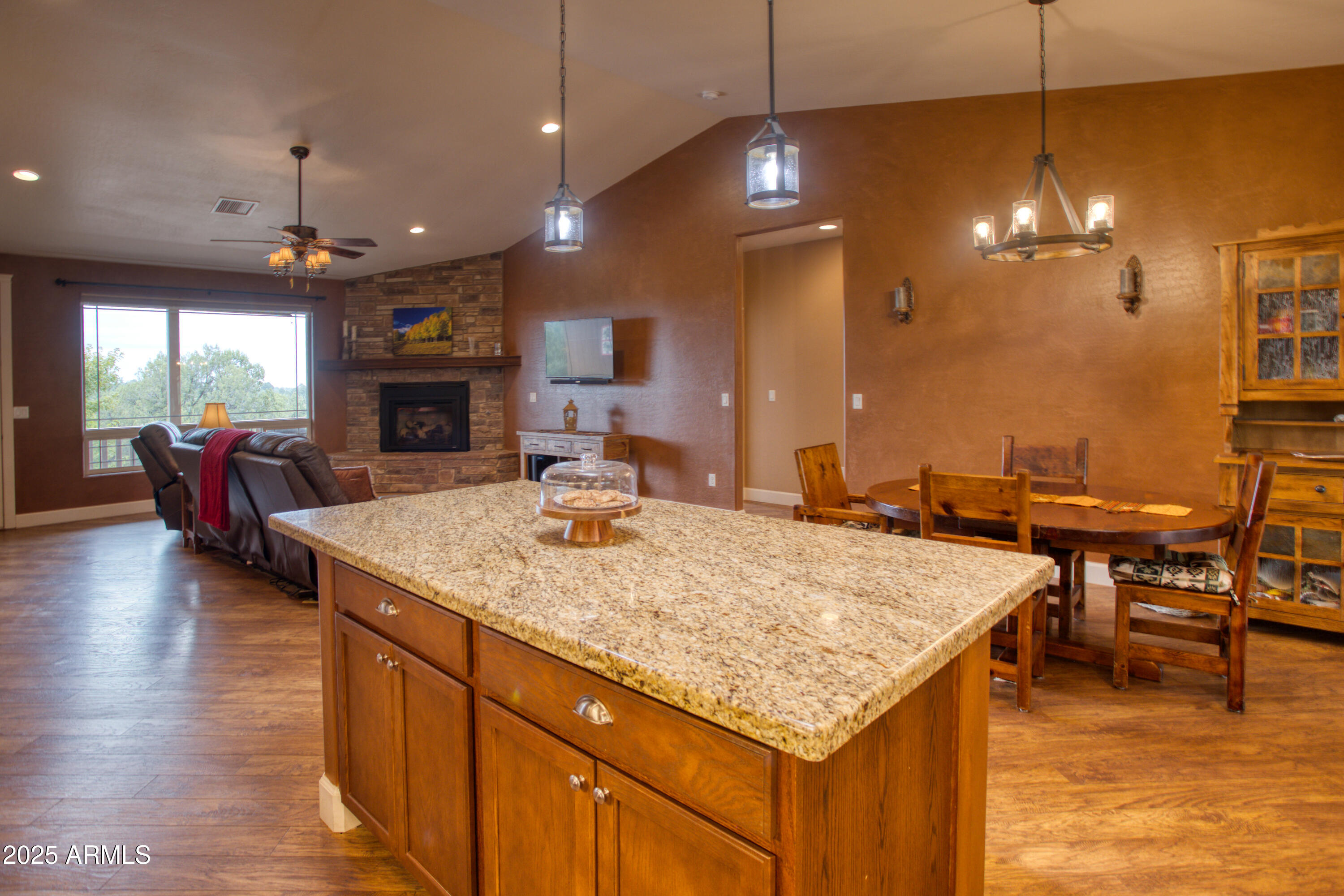 901 South Ridgeline Drive Show Low, AZ 85901 - Photo 9 of 31 a kitchen with sink and refrigerator