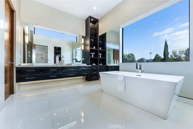 a bathroom with a bathtub and a sink