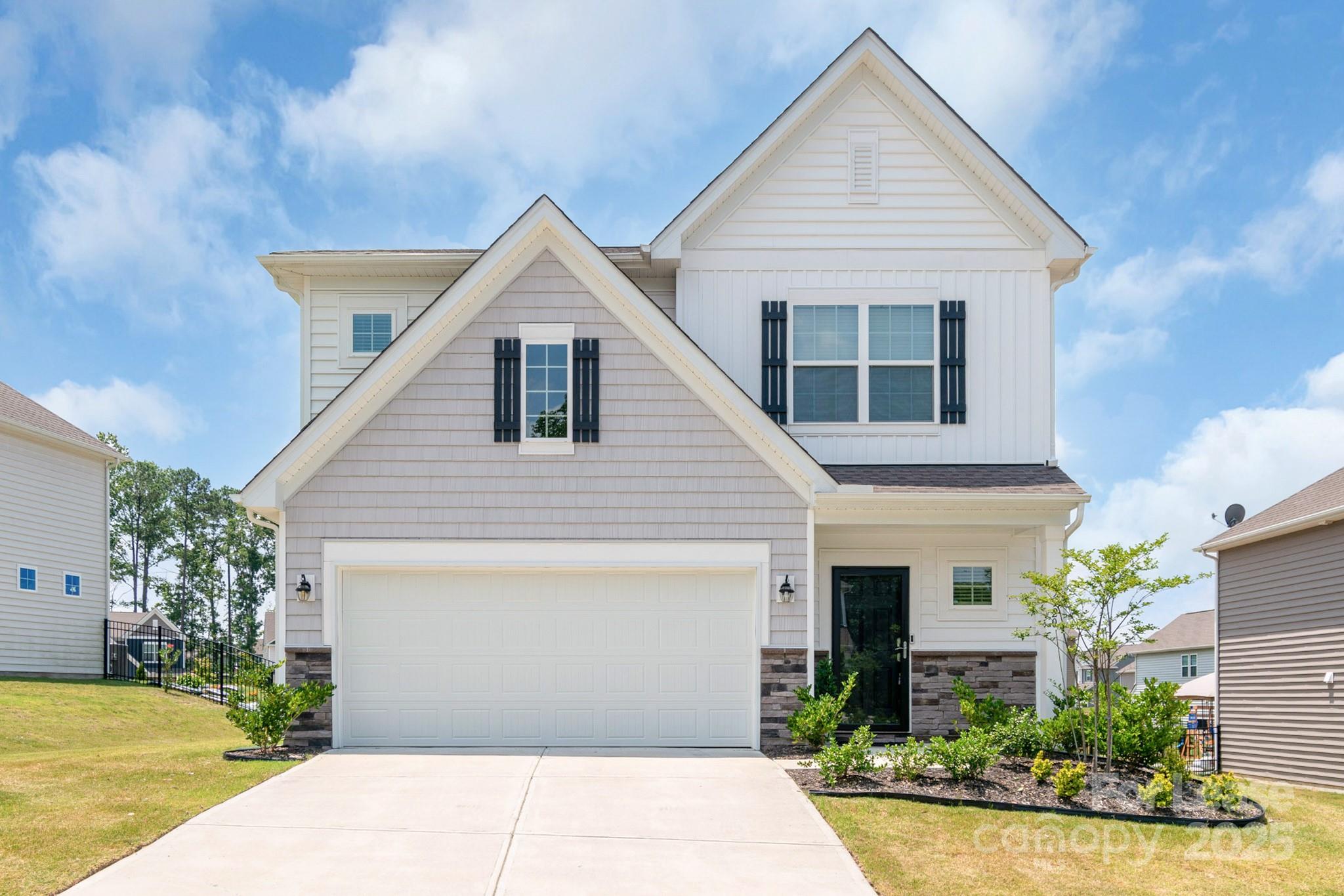 15520 Capps Road Charlotte, NC 28278 - Photo 1 of 48 a view of a house with yard and plants