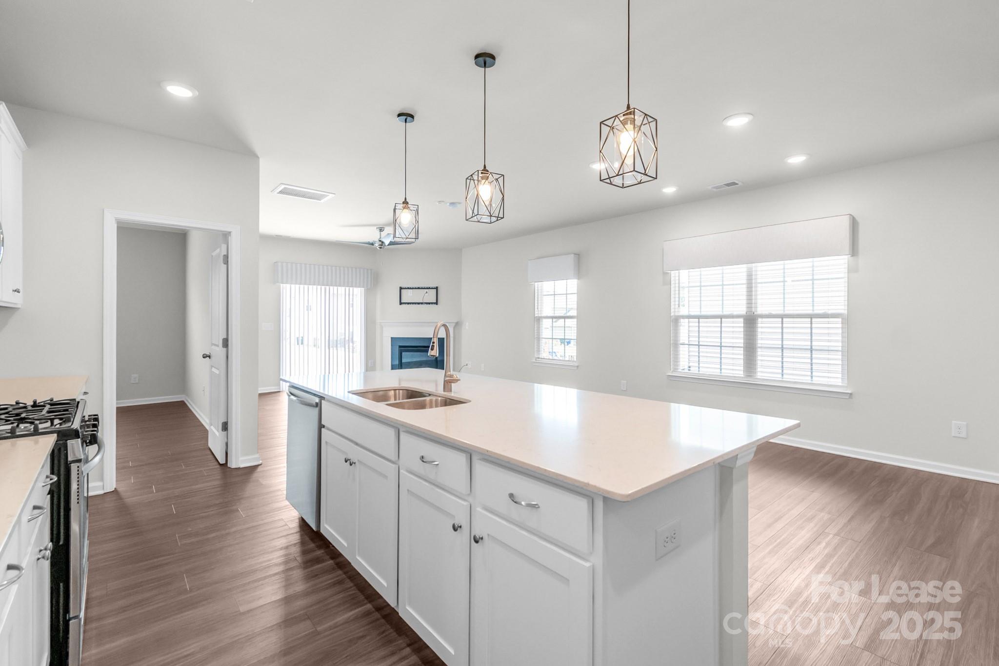 15520 Capps Road Charlotte, NC 28278 - Photo 17 of 48 a kitchen with counter space and wooden floor