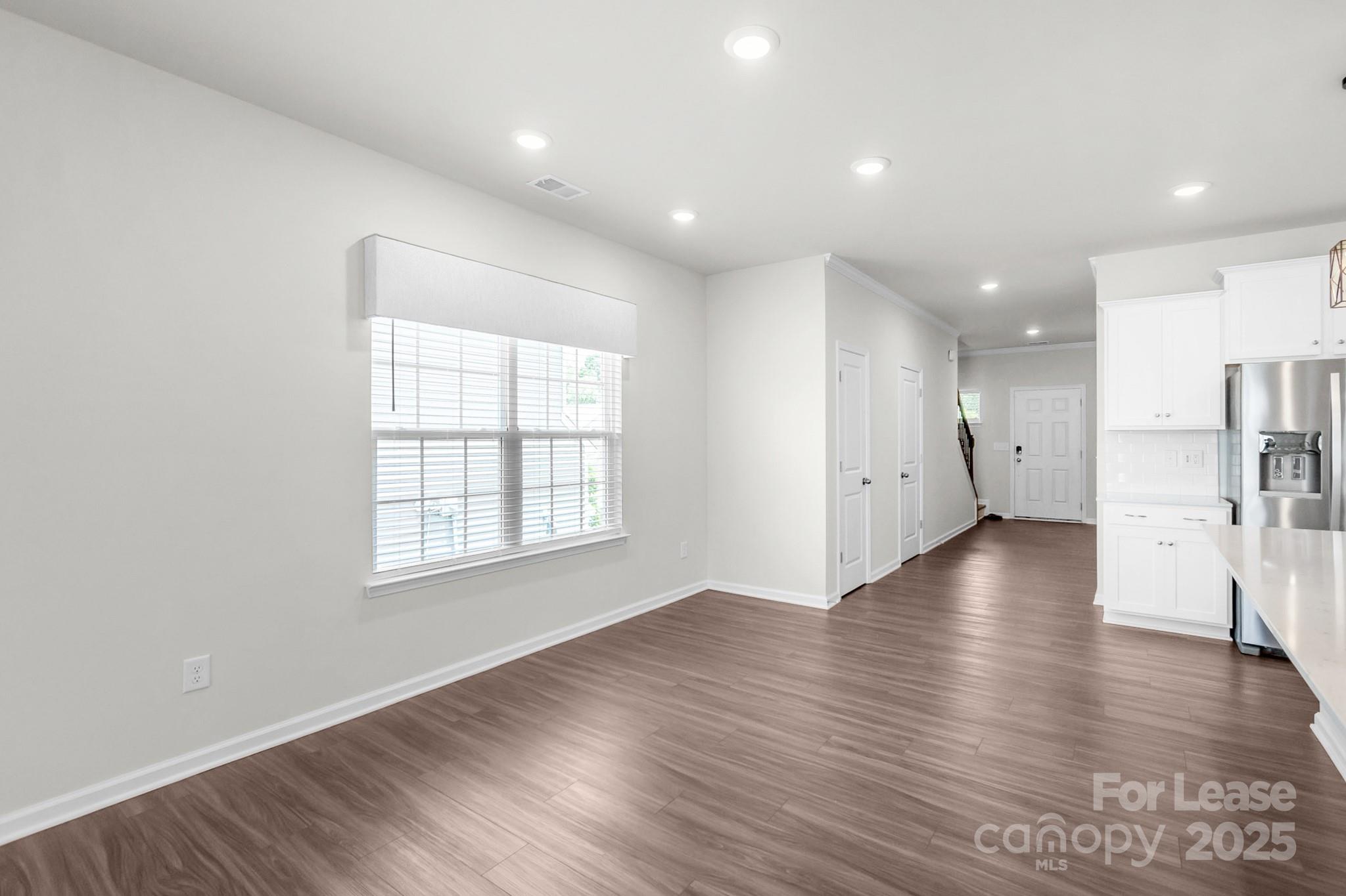 15520 Capps Road Charlotte, NC 28278 - Photo 19 of 48 an empty room with wooden floor and a window