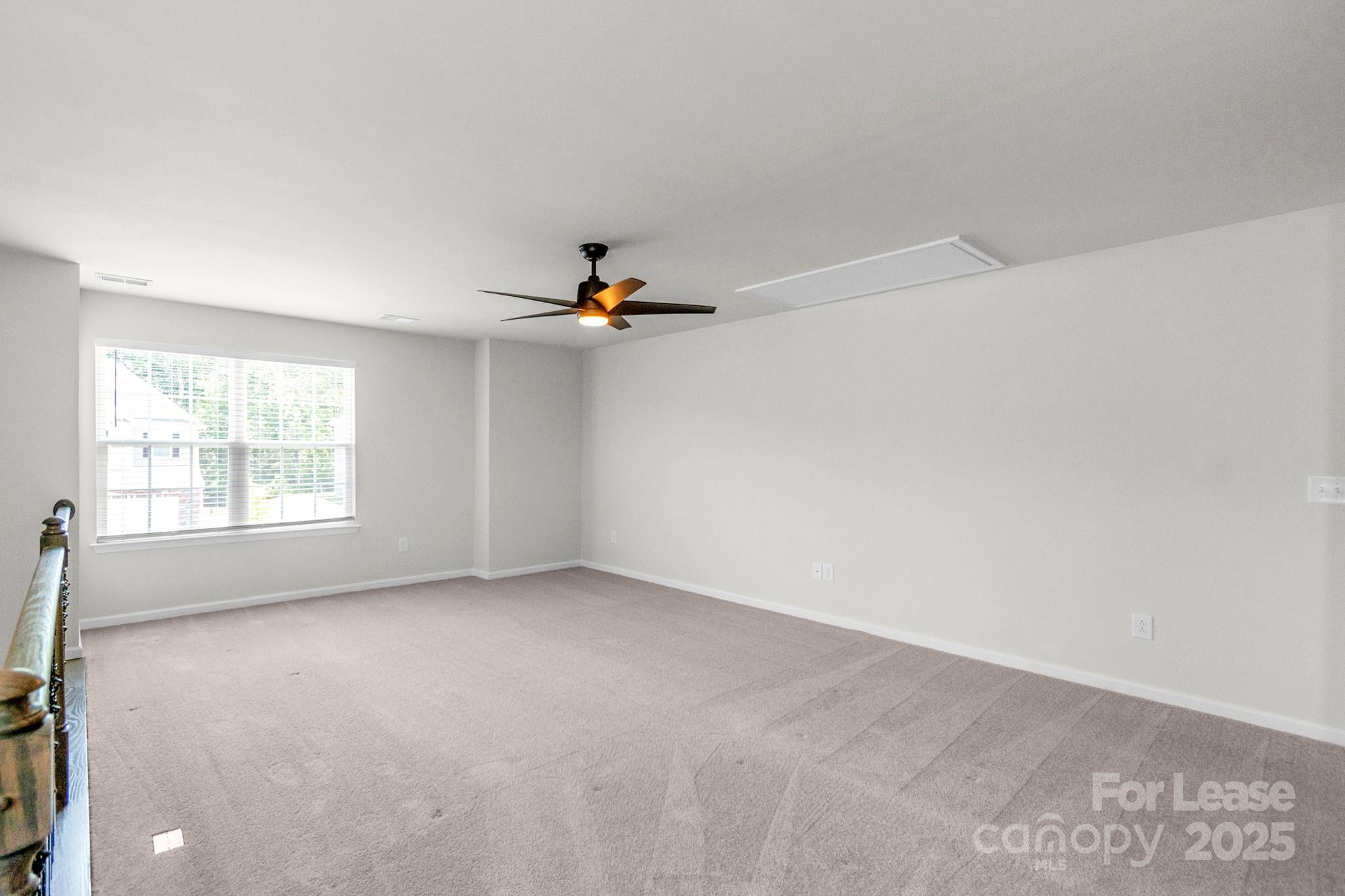 15520 Capps Road Charlotte, NC 28278 - Photo 23 of 48 wooden floor in an empty room with a window