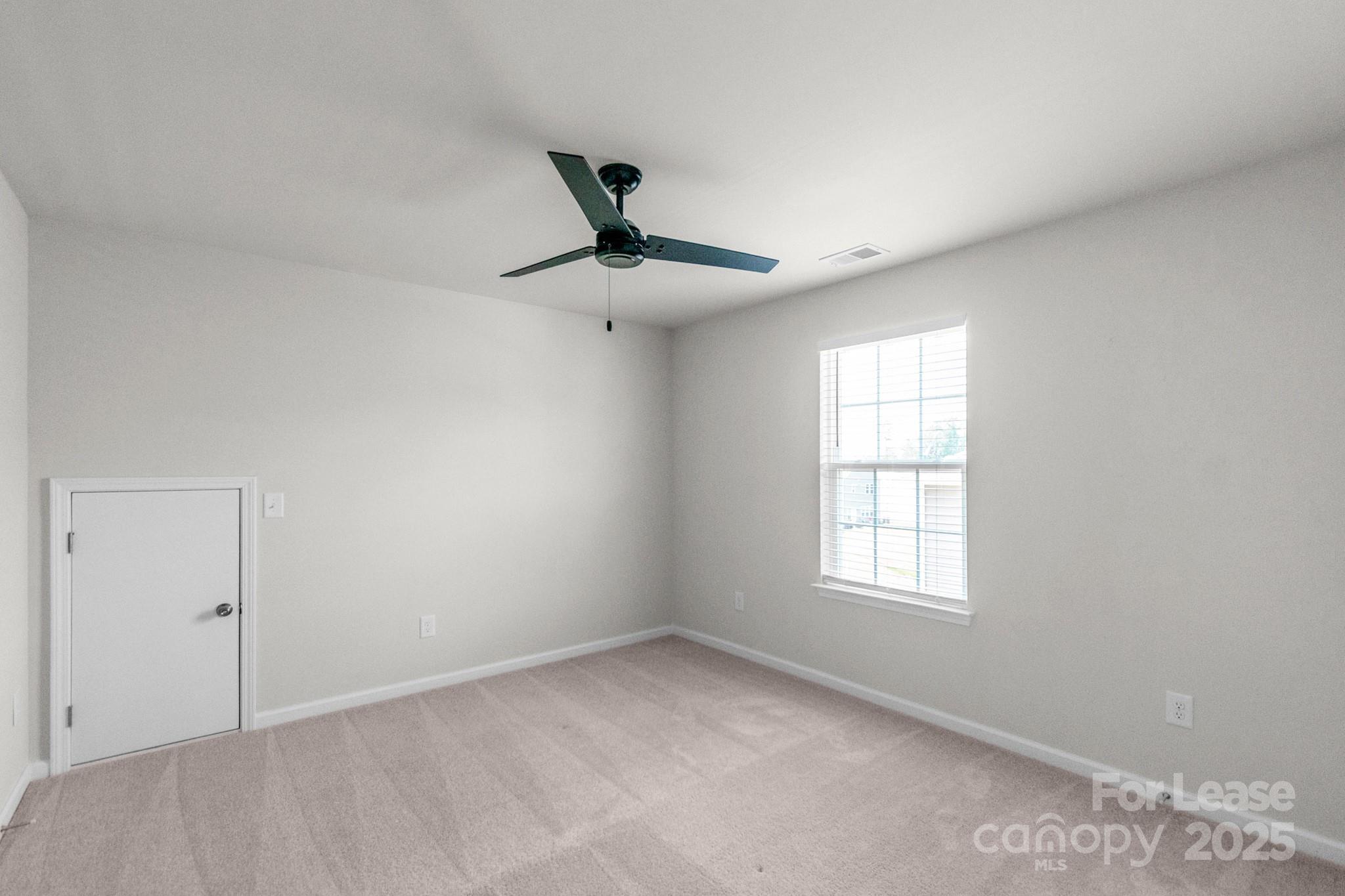 15520 Capps Road Charlotte, NC 28278 - Photo 29 of 48 a view of an empty room with a window