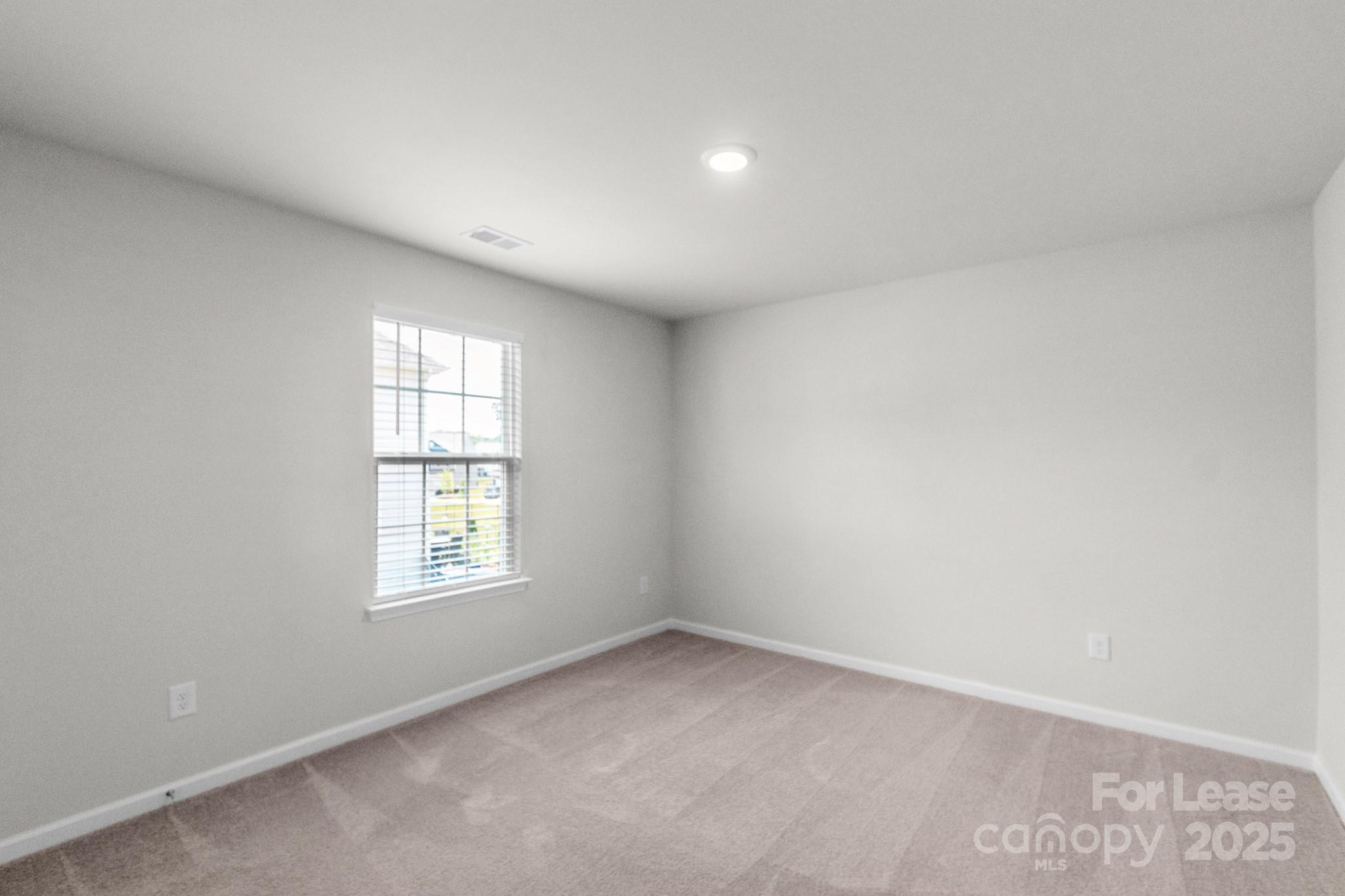 15520 Capps Road Charlotte, NC 28278 - Photo 31 of 48 an empty room with windows