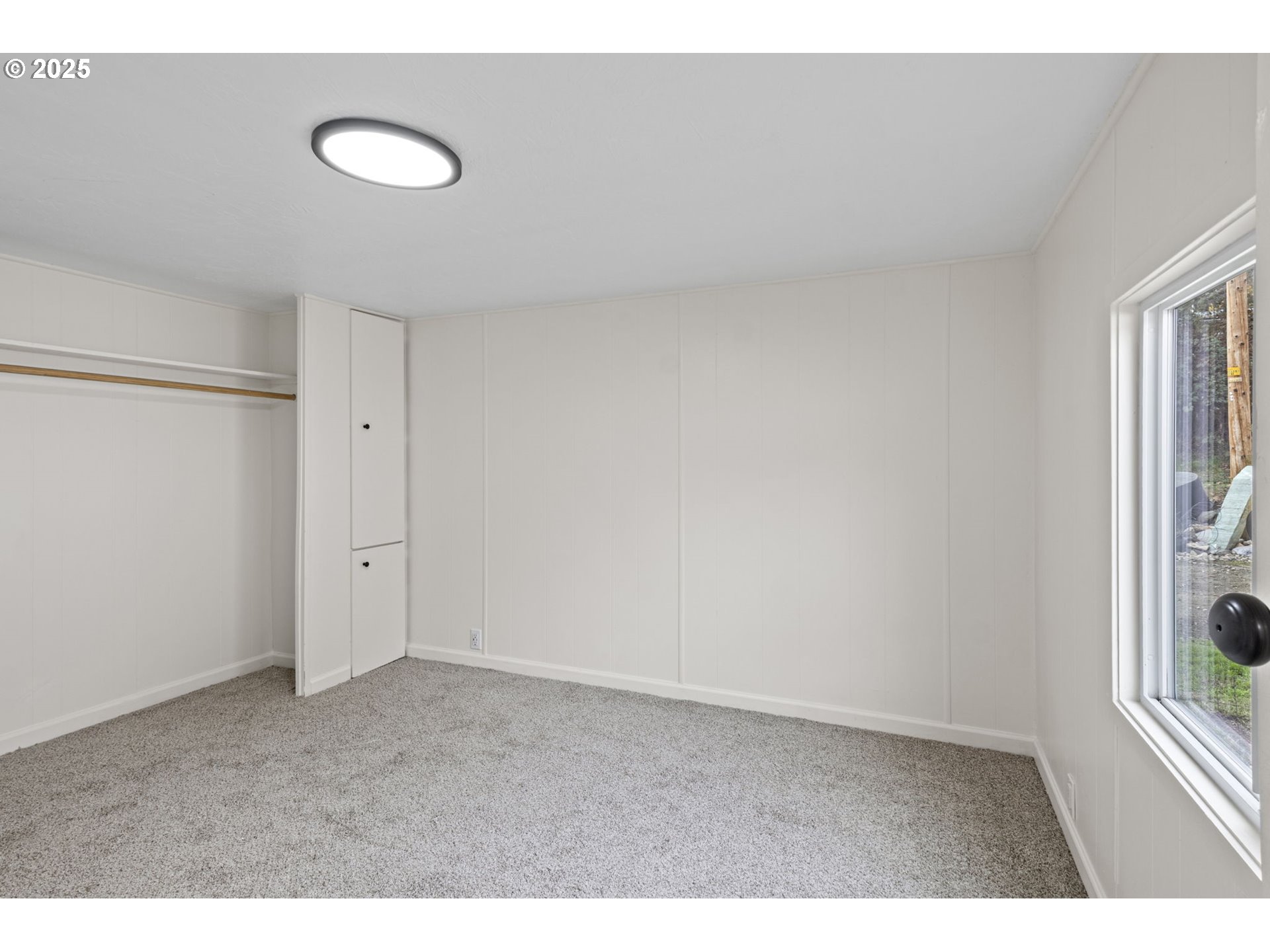 250 Northeast Jorgen Street Winston, OR 97496 - Photo 18 of 36 a view of an empty room with a window