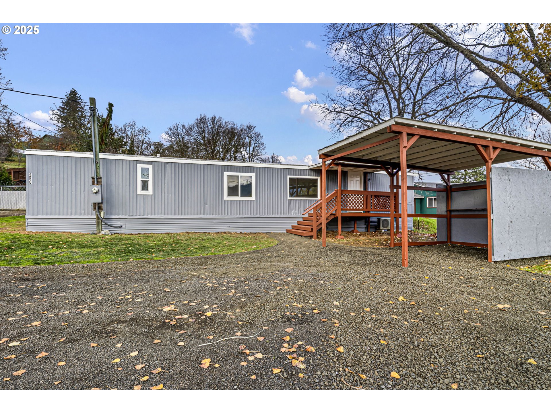 250 Northeast Jorgen Street Winston, OR 97496 - Photo 2 of 36 a view of a house with a yard