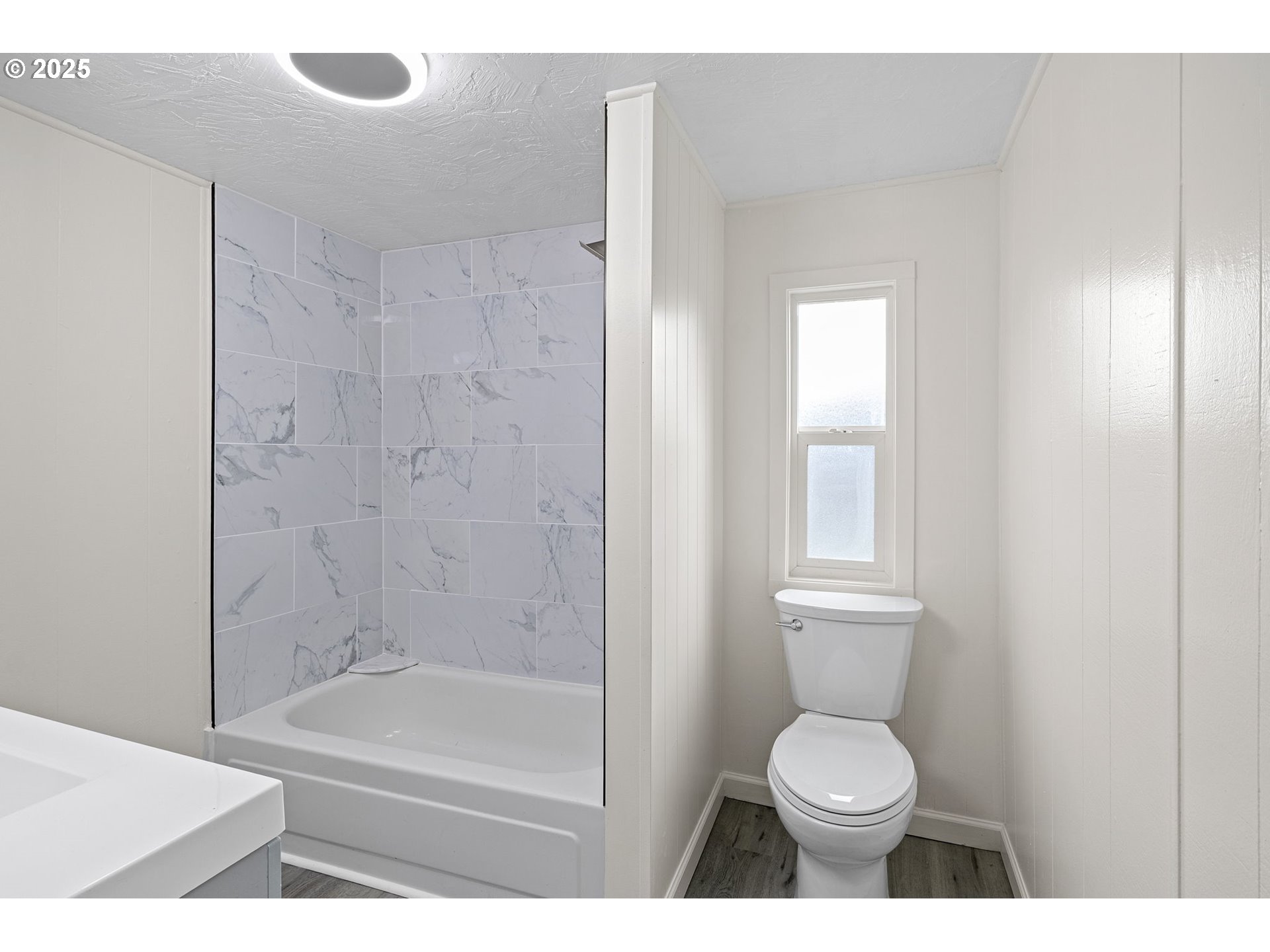 250 Northeast Jorgen Street Winston, OR 97496 - Photo 21 of 36 a bathroom with a toilet and a shower