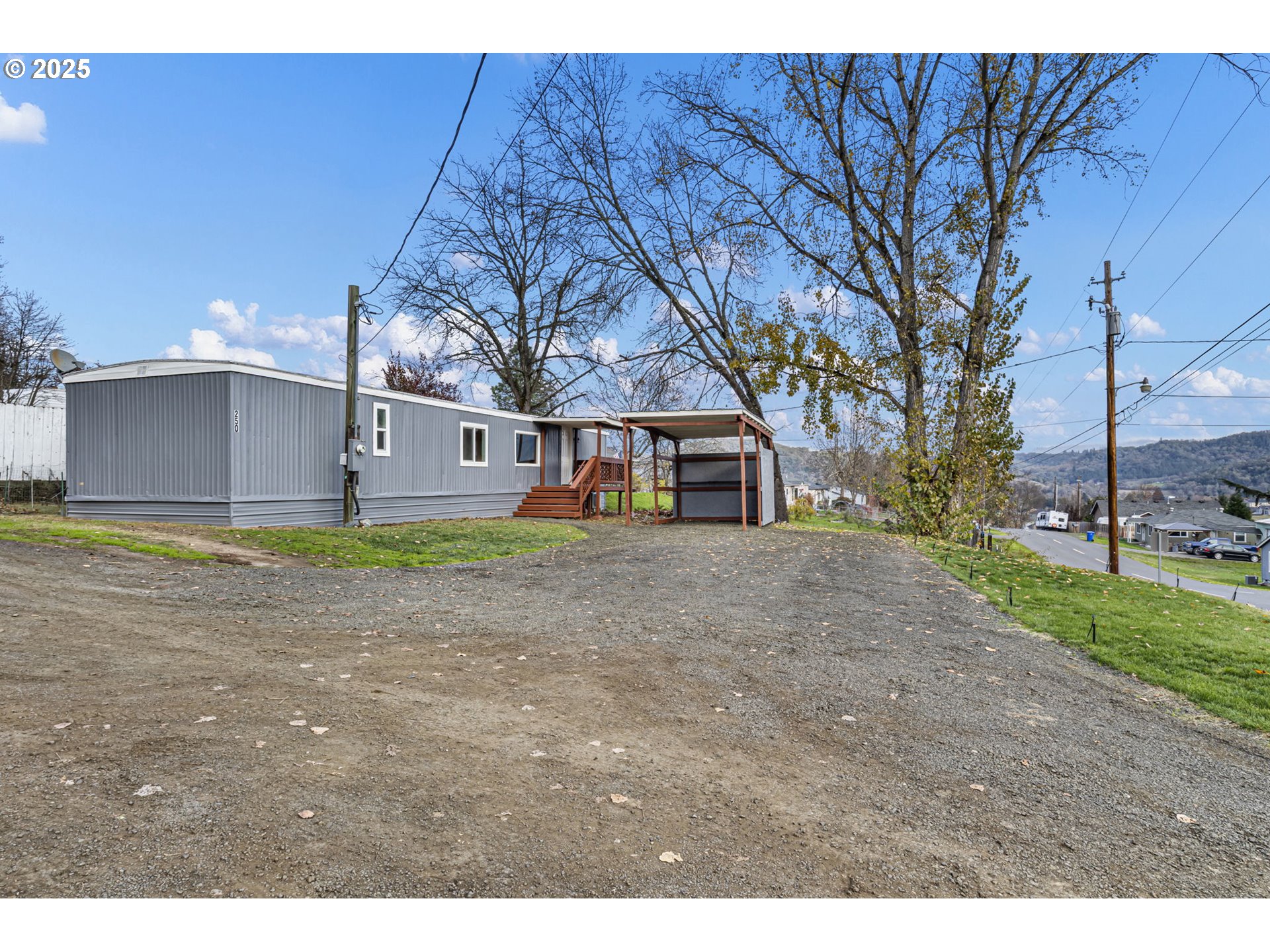 250 Northeast Jorgen Street Winston, OR 97496 - Photo 34 of 36 a view of a house with a yard