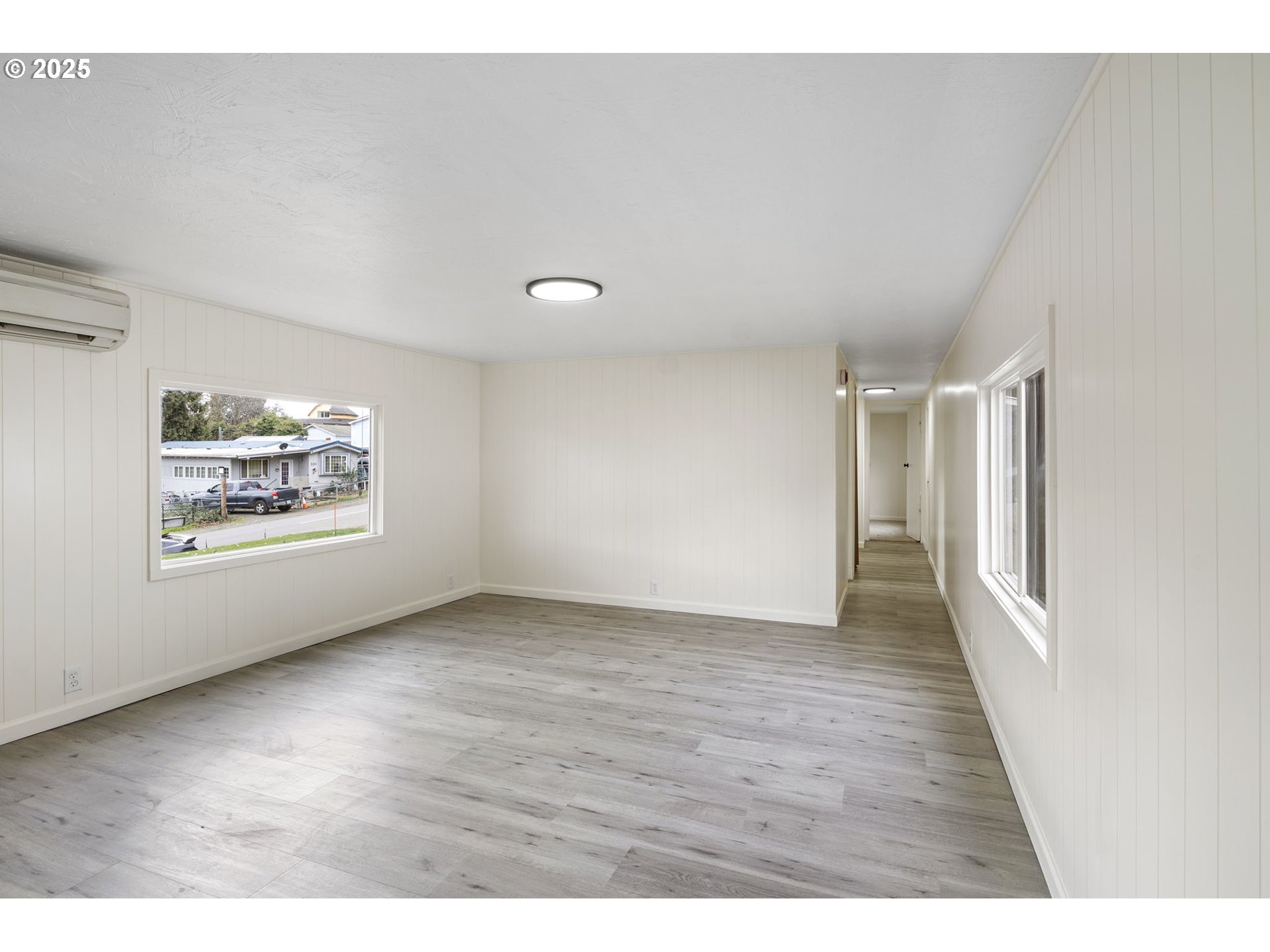 250 Northeast Jorgen Street Winston, OR 97496 - Photo 6 of 36 a view of an empty room with a window