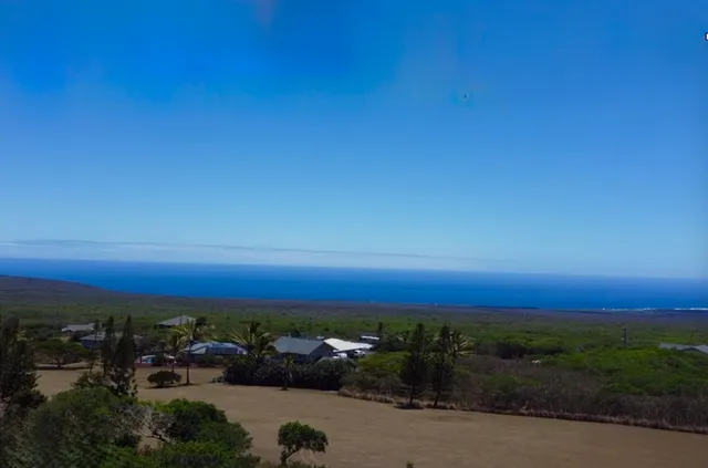 a view of a lake with a city