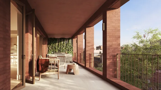 a view of a hallway with wooden floor and closet