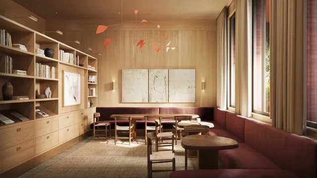 a view of a dining room with furniture wooden floor and a chandelier