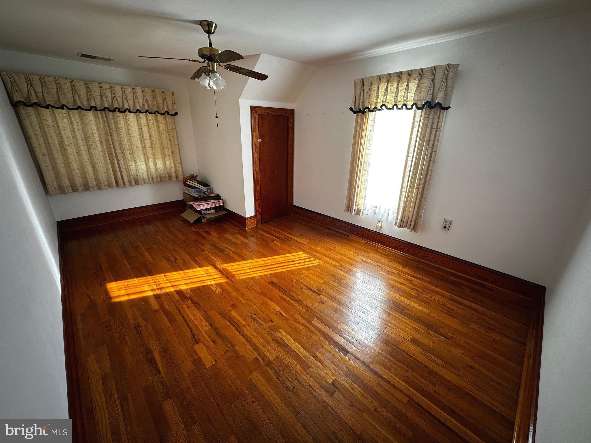 3500 Paw Paw Road Paw Paw, WV 25434 - Photo 17 of 48 wooden floor in an empty room with a window