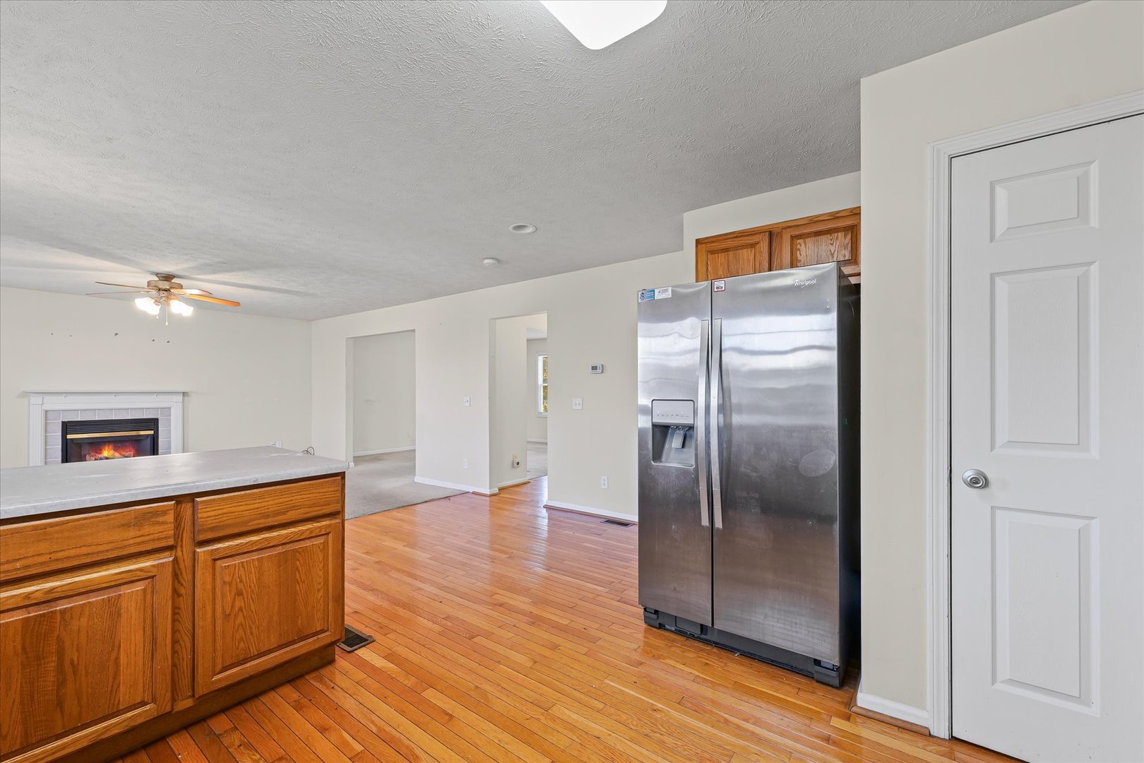 1418 Ogelthorpe Avenue Urbana, IL 61802 - Photo 15 of 36 a kitchen with white cabinets and stainless steel appliances