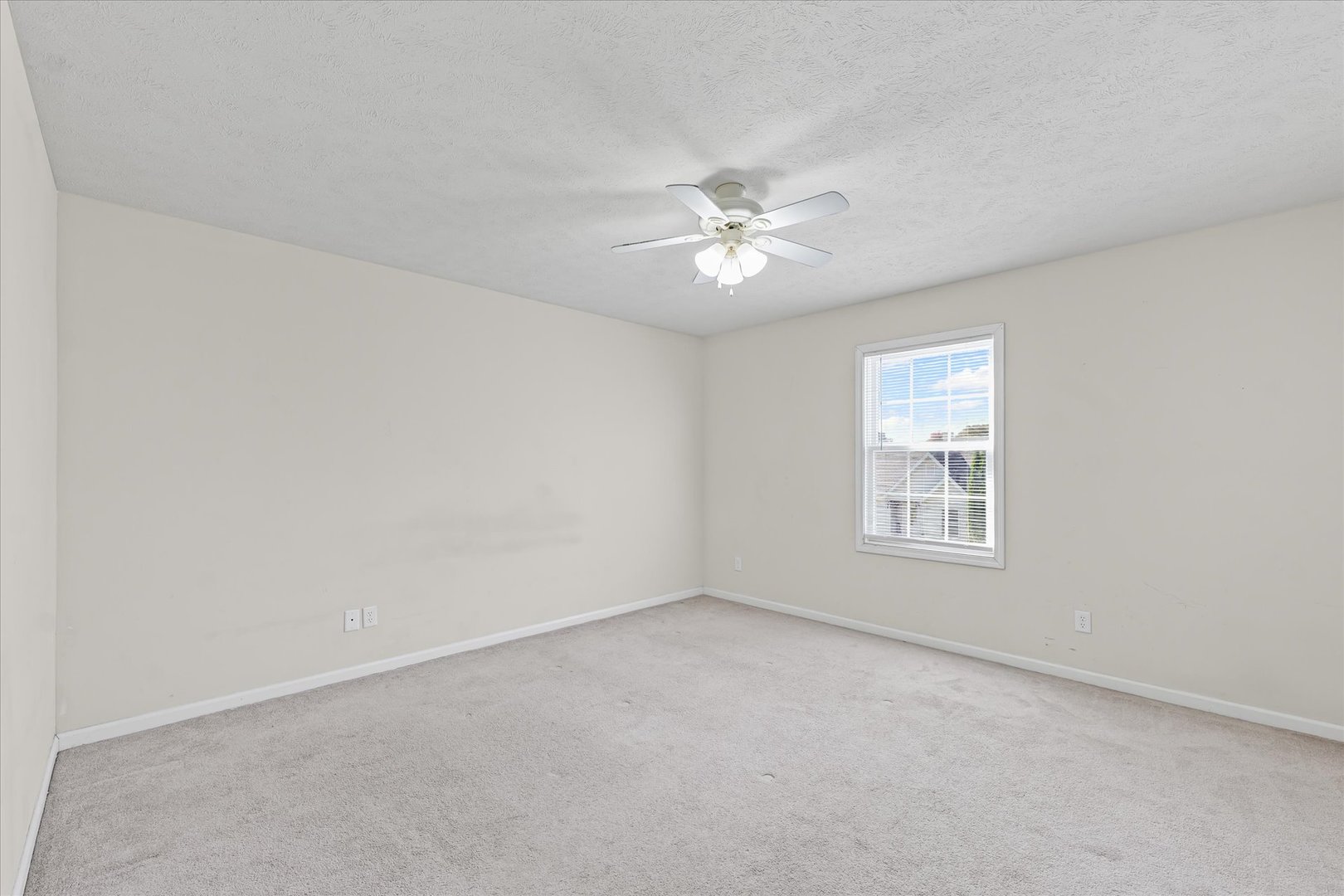 1418 Ogelthorpe Avenue Urbana, IL 61802 - Photo 17 of 36 an empty room with a window
