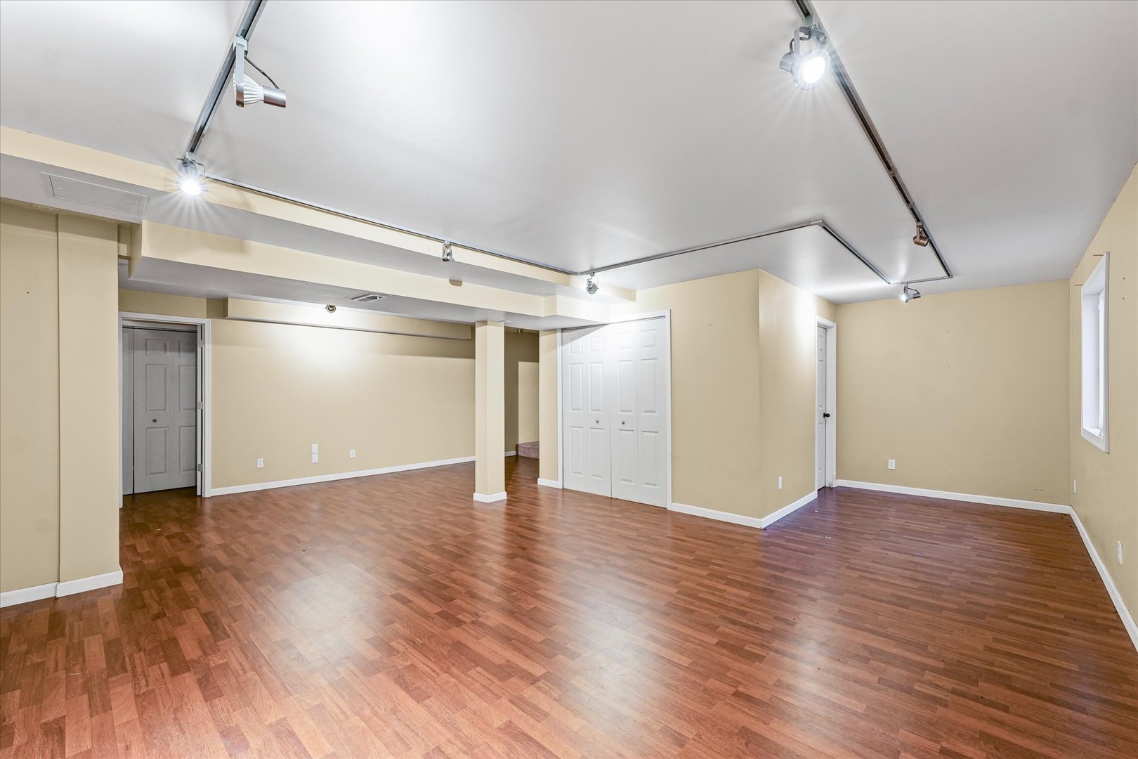 1418 Ogelthorpe Avenue Urbana, IL 61802 - Photo 27 of 36 a view of an empty room with wooden floor