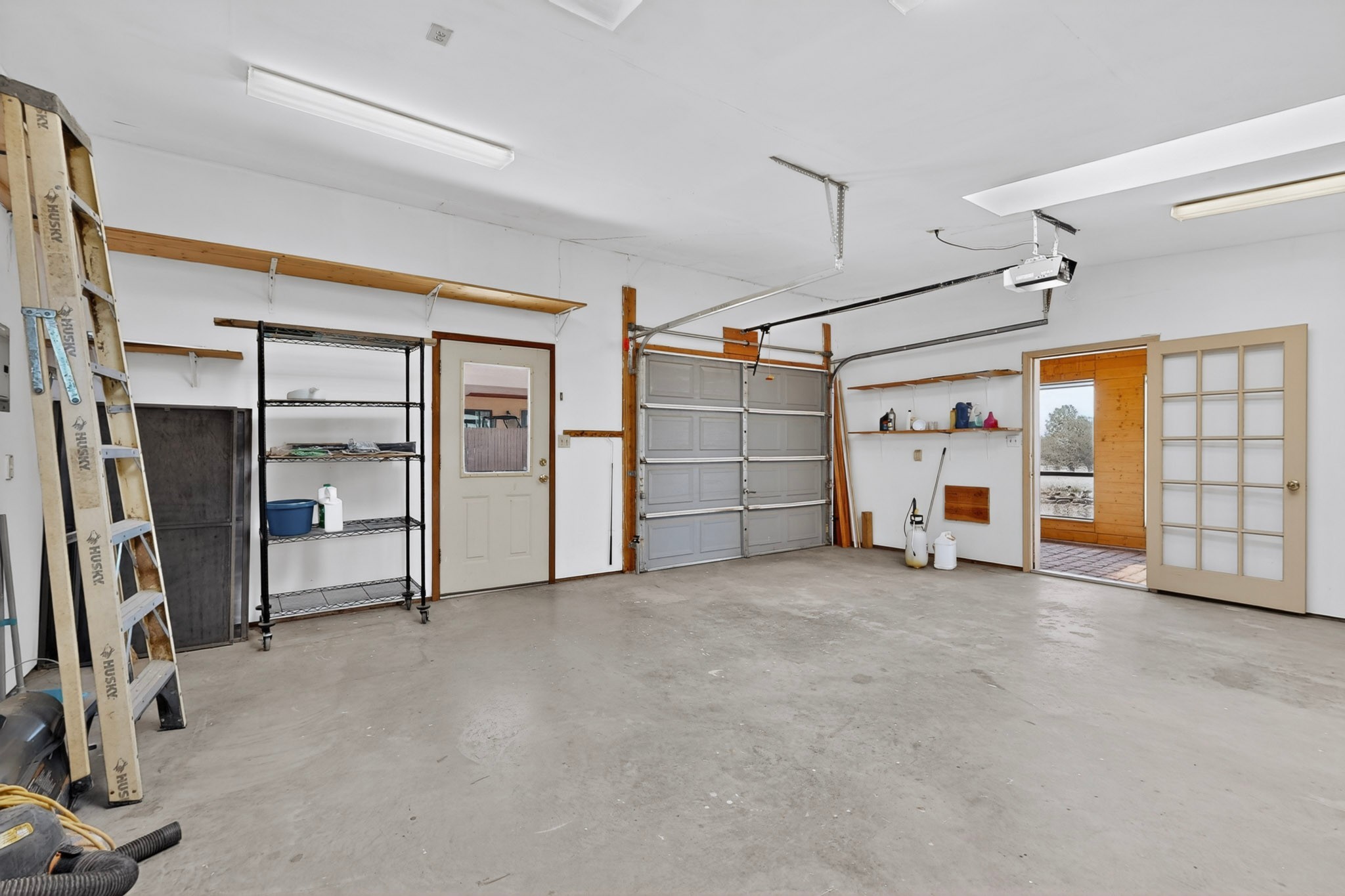 10 Blue Mesa Road Santa Fe, NM 87508 - Photo 55 of 63 Garage/workdop. Can easily have the second o'head door replaced.
