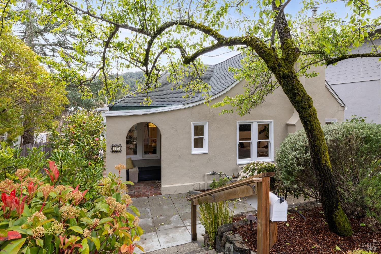 27 Rutherford Avenue San Anselmo, CA 94960 - Photo 1 of 1 a front view of a house with a garden