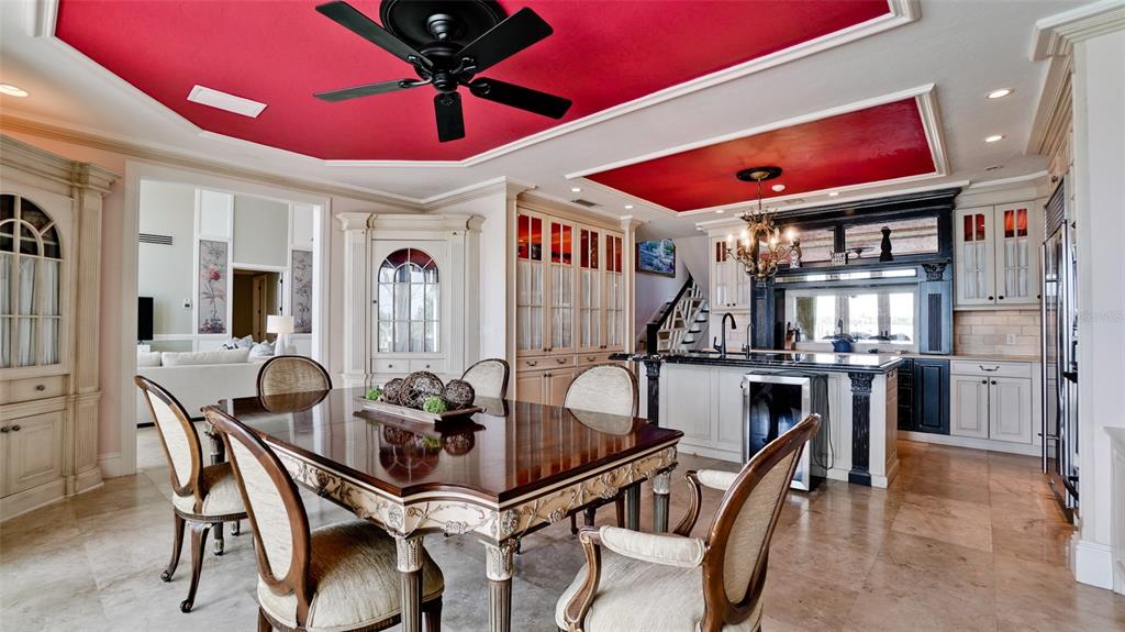 8213 Midnight Pass Road Sarasota, FL 34242 - Photo 14 of 52 a dining room with furniture and window
