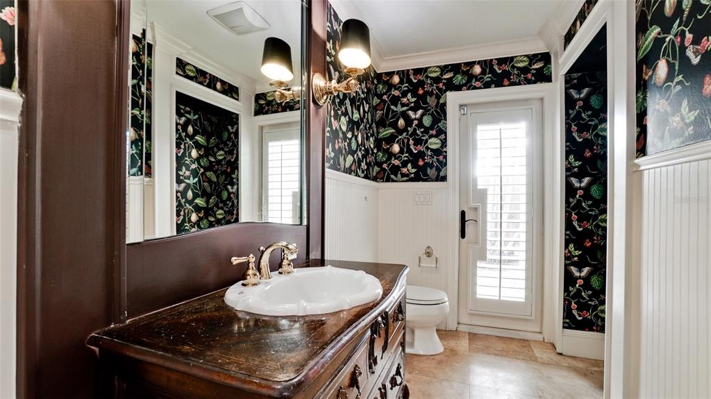 8213 Midnight Pass Road Sarasota, FL 34242 - Photo 34 of 52 a view of a dining room with furniture window and wooden floor
